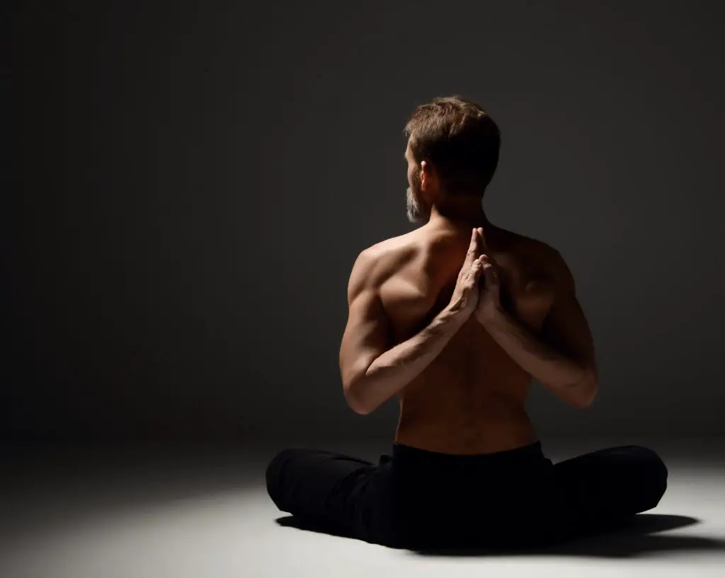 Explore the Benefits and Risks of Practicing Dark Yoga - BetterYoga